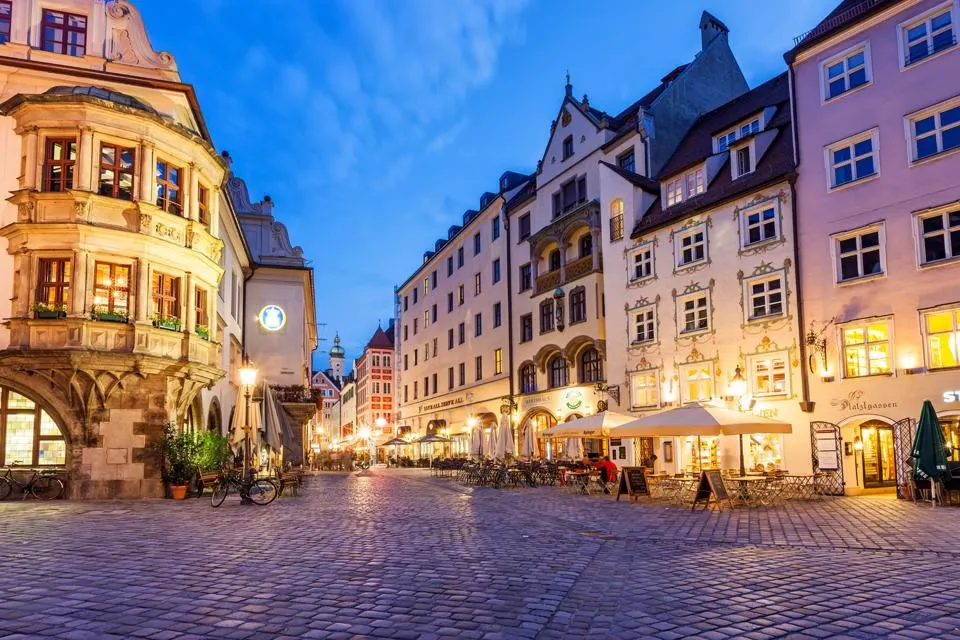 Get weed in Munich - 2026 cannabis travel guide header image showing Munich skyline with cannabis elements